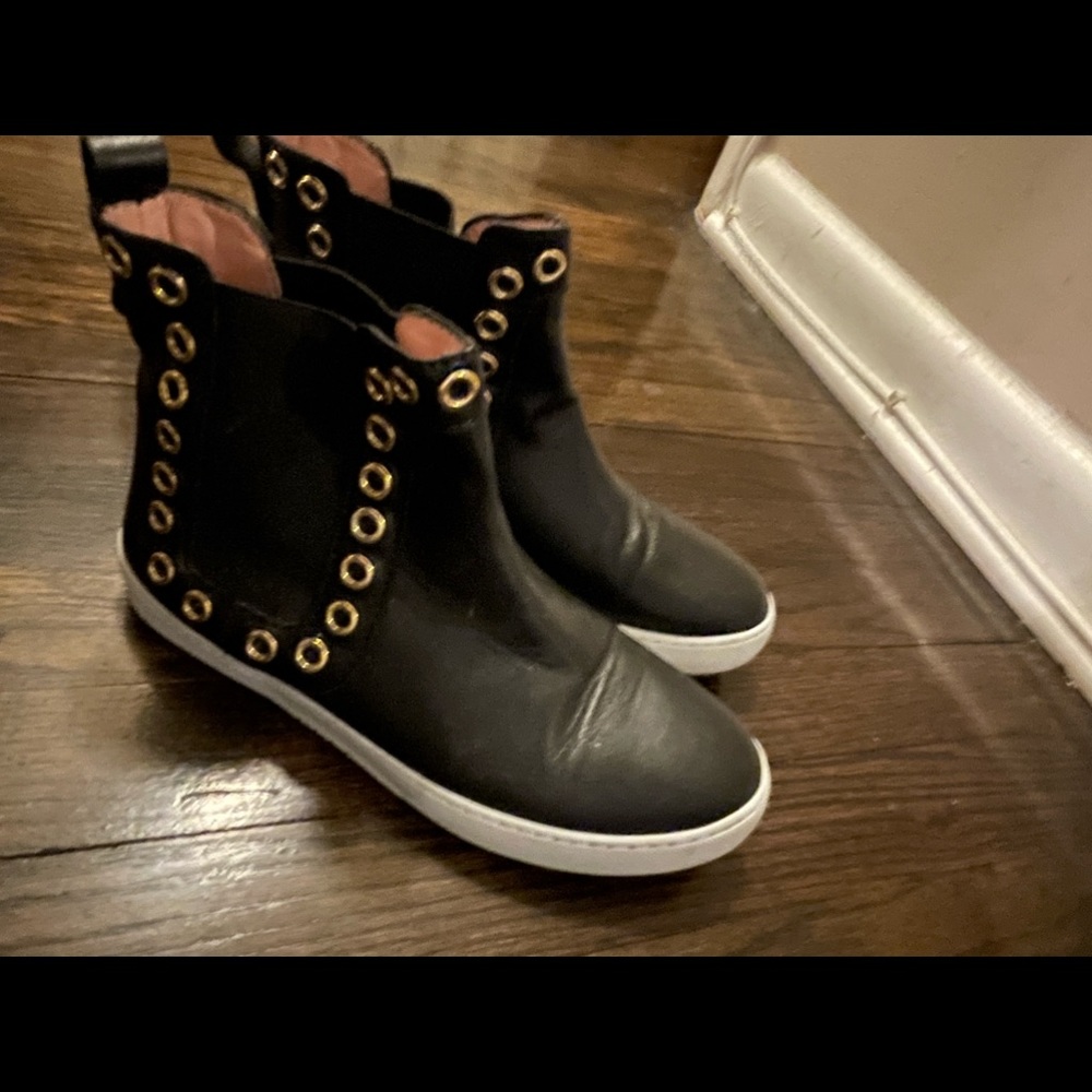 black w gold rivet circles Moschino tennis shoes worn twice.